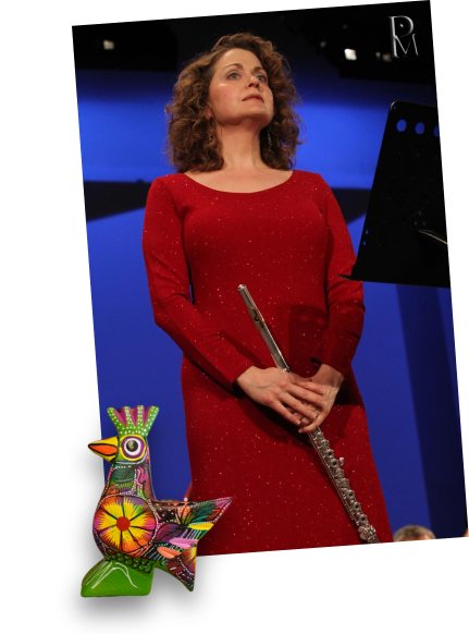 Merrie in red dress with her flute